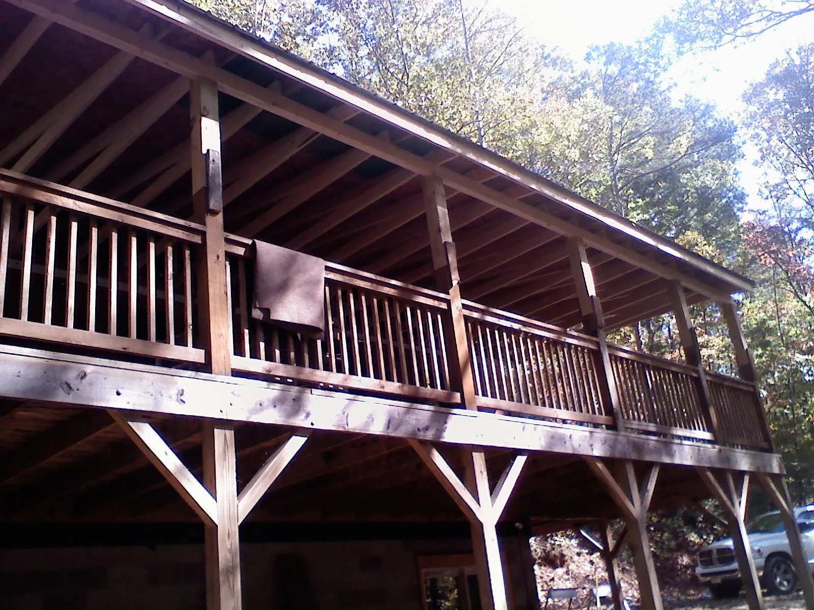 Timber framing under a new elevated porch and deck — Roof Leak Repair in Fosston by Roofing Brothers